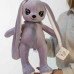 Плюшевый заяц сиреневого цвета с большими глазками