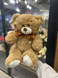 Плюшевый мишка с кремовым бантом (30 см) 254